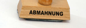 Stempel mit Schriftzug Abmahnung
